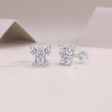 Clover moissanite studs with back and post, four round stones in white gold