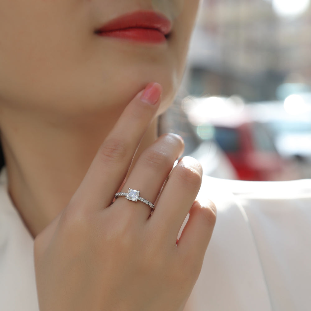 Asscher-cut moissanite pave engagement ring worn on hand