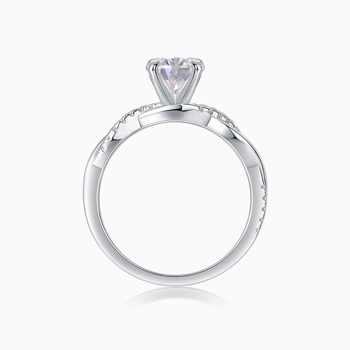 Round cut moissanite pavé ring, top view of round center stone and pavé detailing