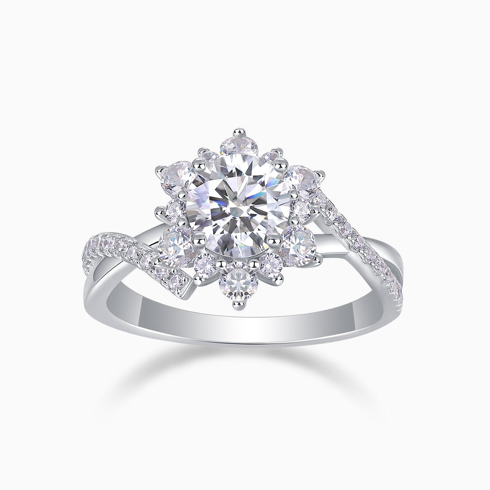 Round halo twist engagement ring with large center moissanite and split pavé band