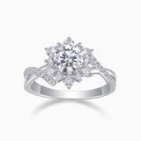 Round halo twist engagement ring with large center moissanite and split pavé band