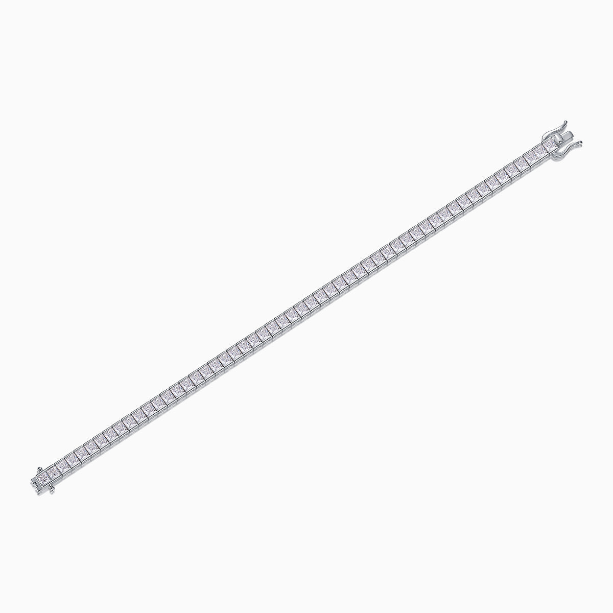 Princess cut moissanite tennis bracelet laid flat, silver-toned with square stone line