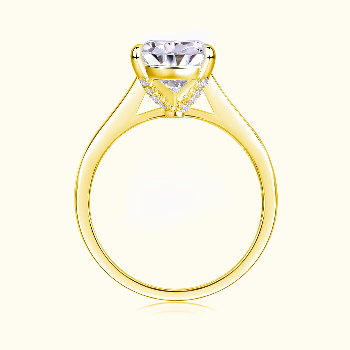 Yellow gold vermeil pear-cut solitaire moissanite ring, side view of setting details