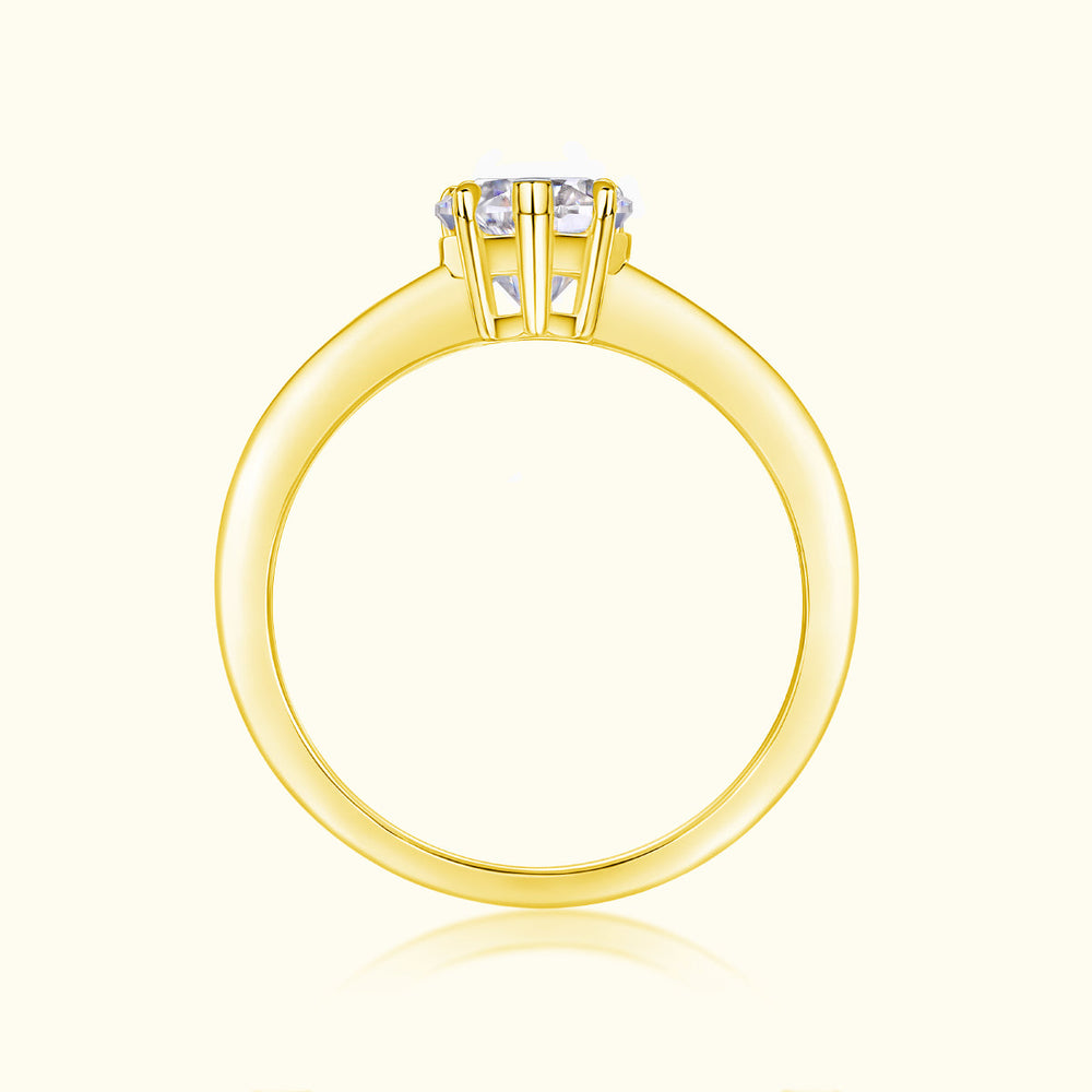 Heart-cut moissanite solitaire ring, prong setting detail in yellow gold vermeil