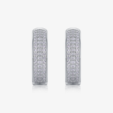 Moissanite huggie hoops, white gold vermeil, pavé stone bands, front pair.