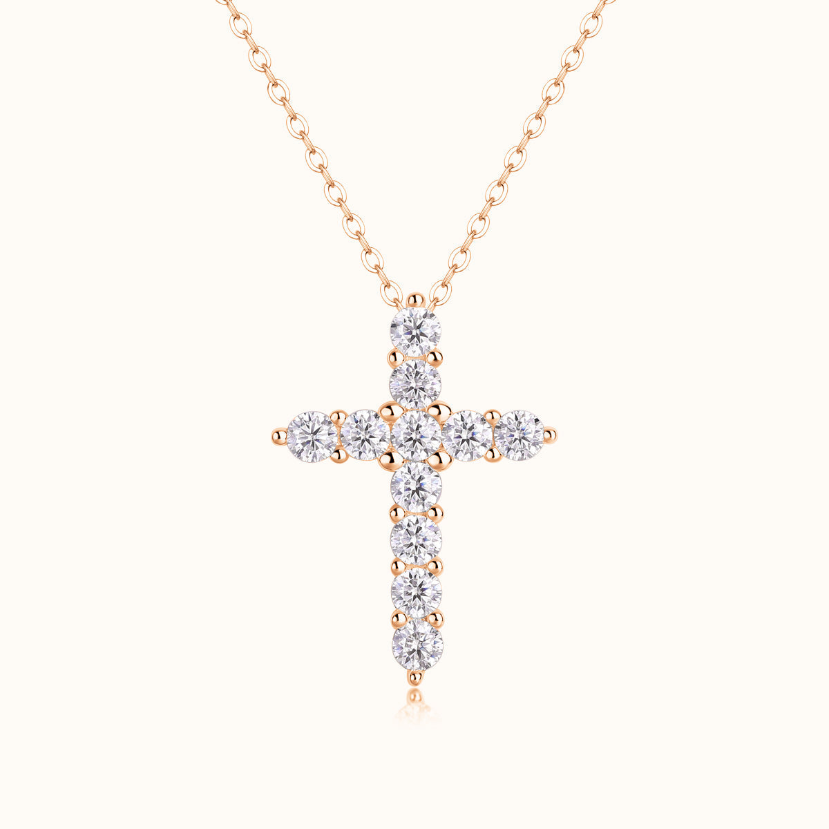 Rose gold vermeil round moissanite cross pendant with bezel-set round stones