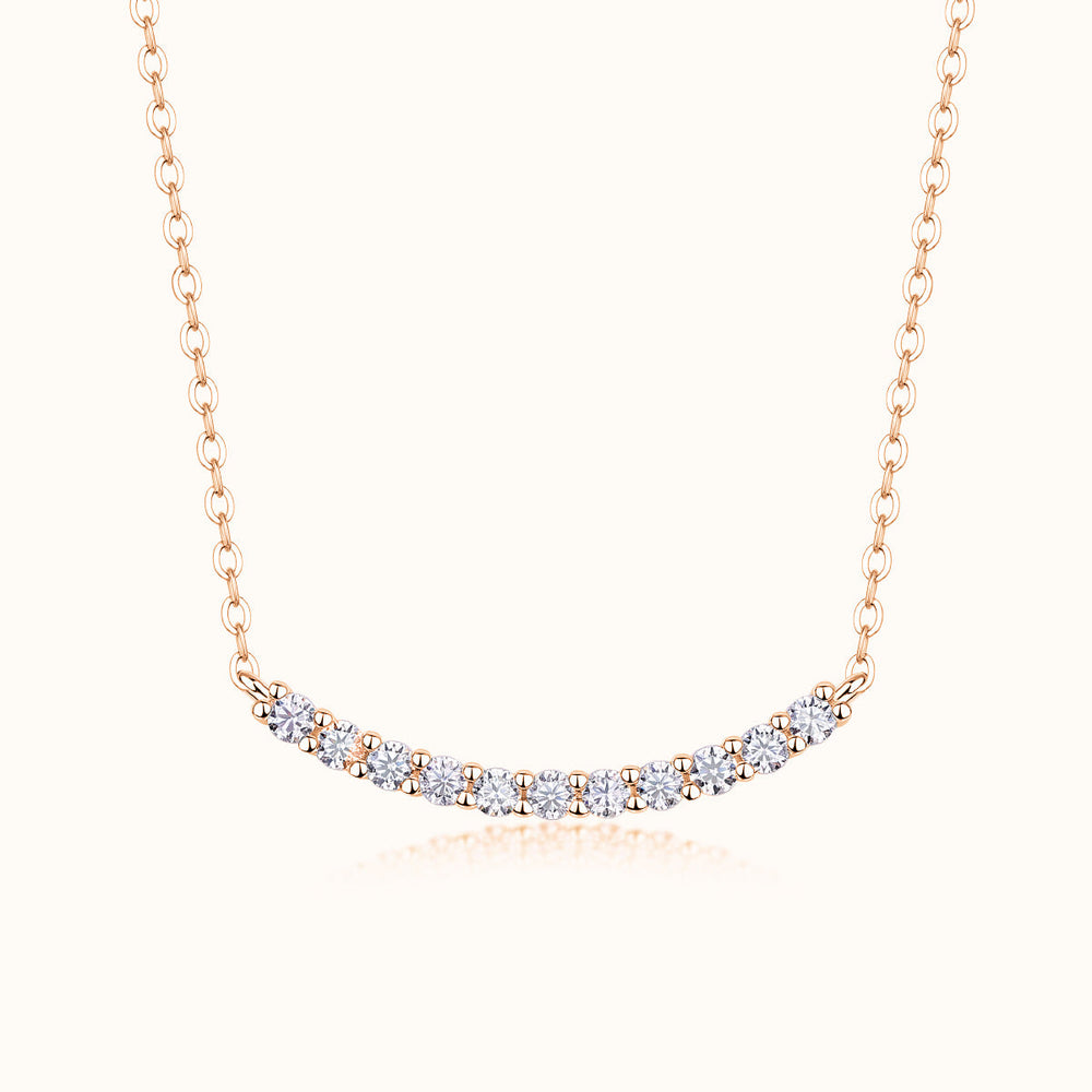 Rose Gold Vermeil curved bar moissanite smile necklace with round bright stones