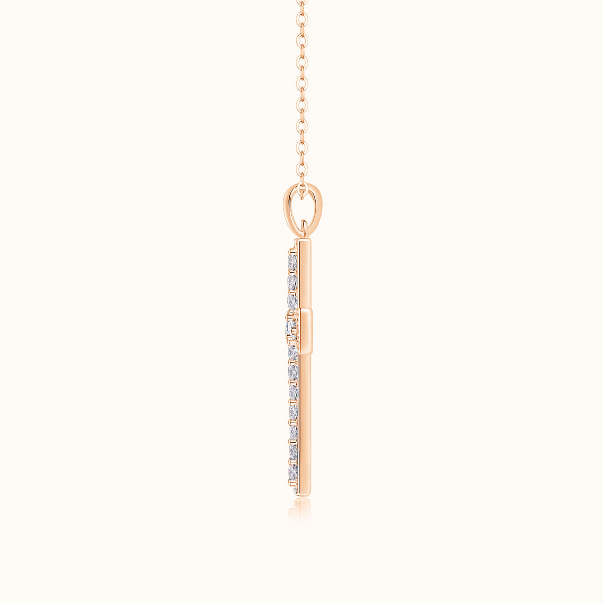 Rose gold vermeil pavé cross pendant, side view with stone-lined panels