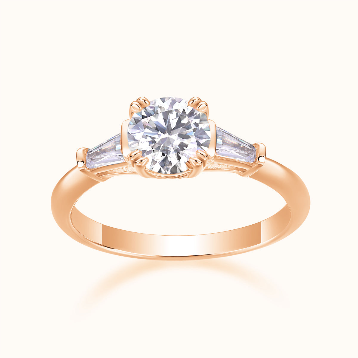 Three-stone round moissanite engagement ring, rose gold vermeil, side baguettes