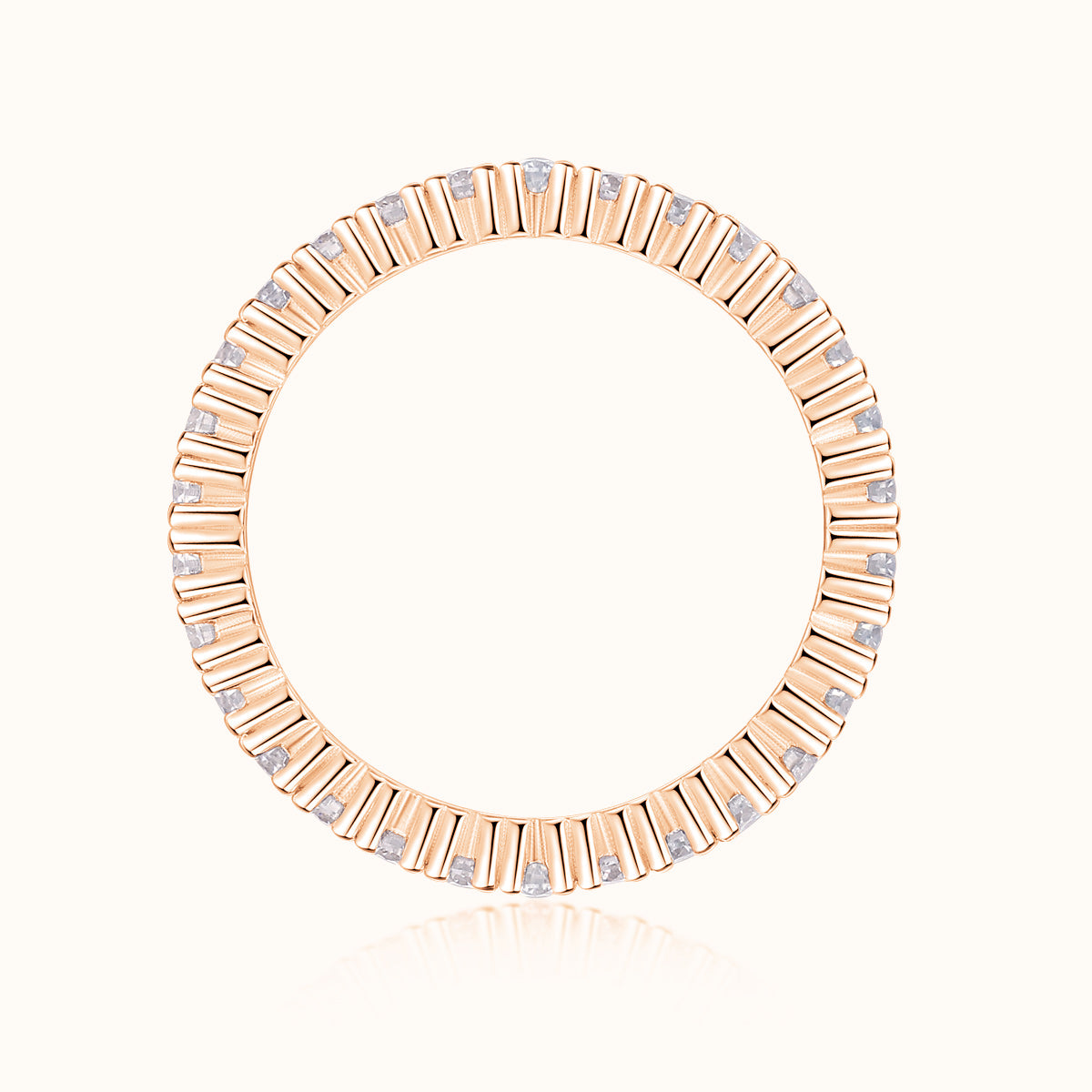 Minimalist pavé moissanite stacking ring on rose gold vermeil band, straight view