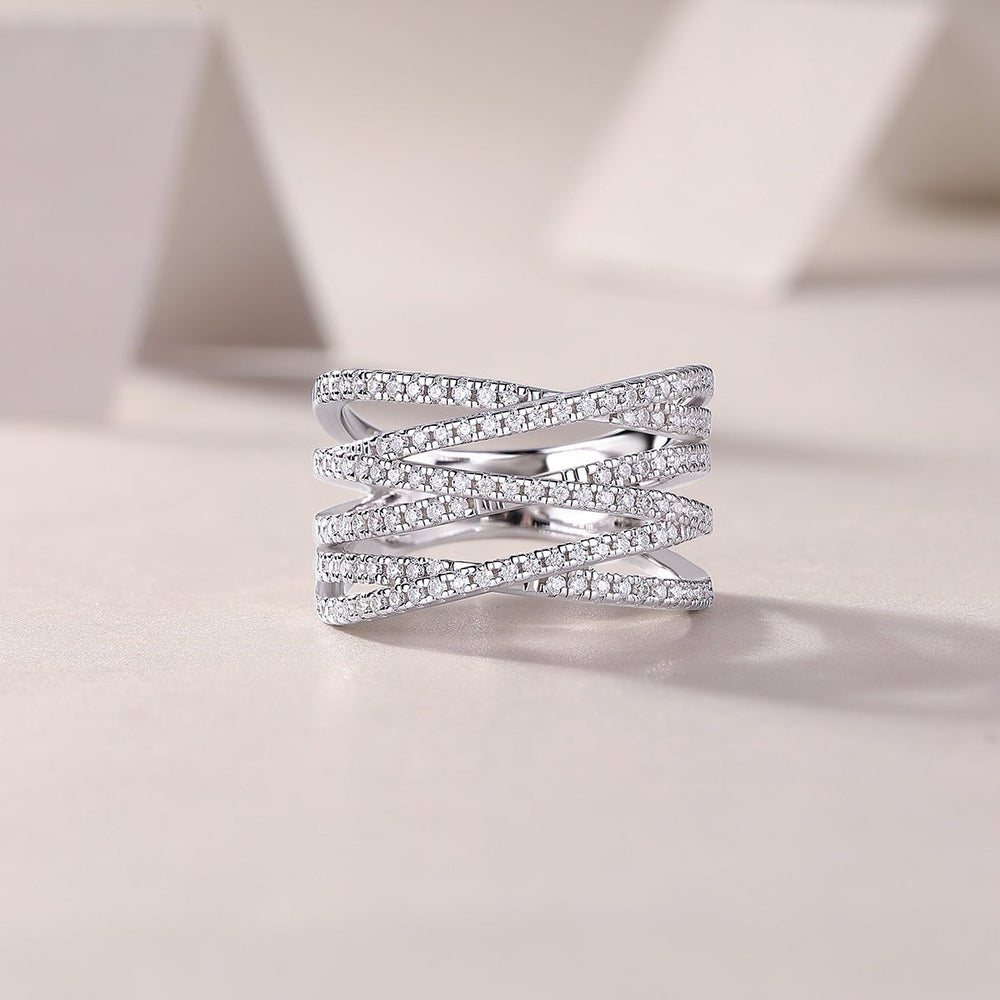 Crossover moissanite band, multi-row pavé with crisscross front profile