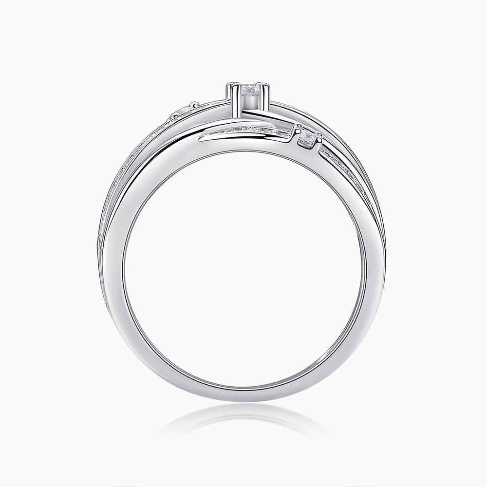 Reverse view of crossover wide band ring showing pavé band and prong-set stone