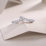 Curved pavé moissanite wedding band, white gold vermeil, profile view with stones