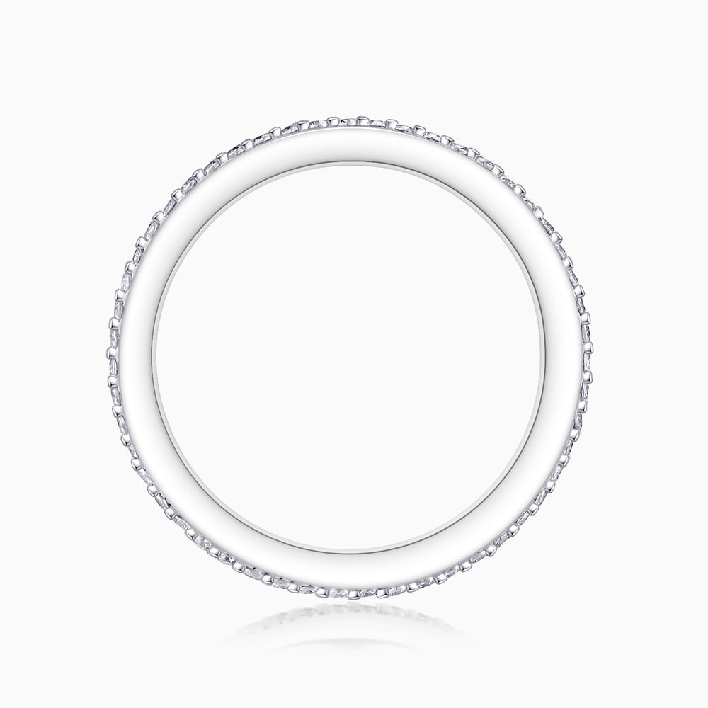 Inside edge view of emerald-cut eternity band with smooth inner shank