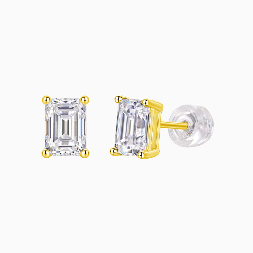 Emerald cut moissanite stud earrings with yellow gold vermeil prongs and clear stone