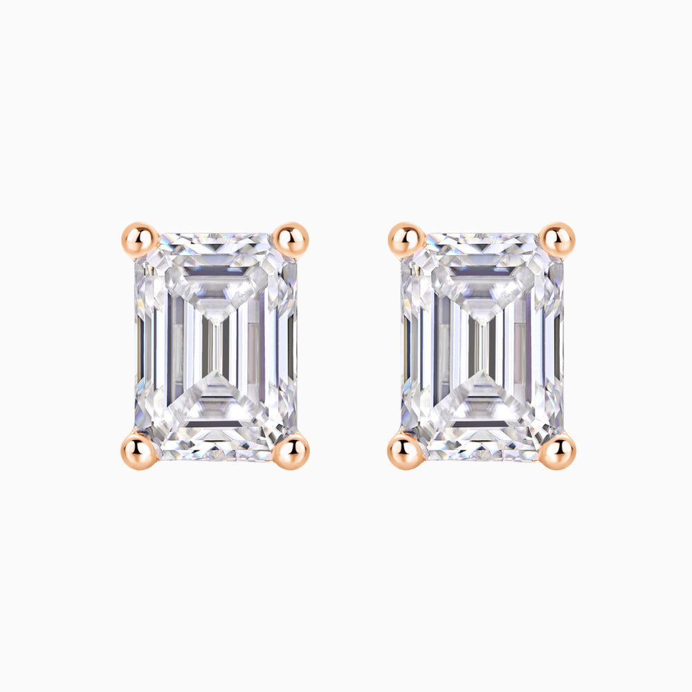 Pair of emerald cut moissanite stud earrings in rose gold vermeil
