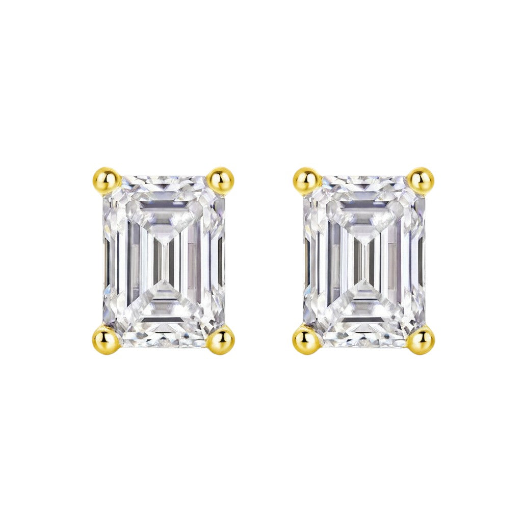 Pair of emerald cut moissanite stud earrings in yellow gold vermeil
