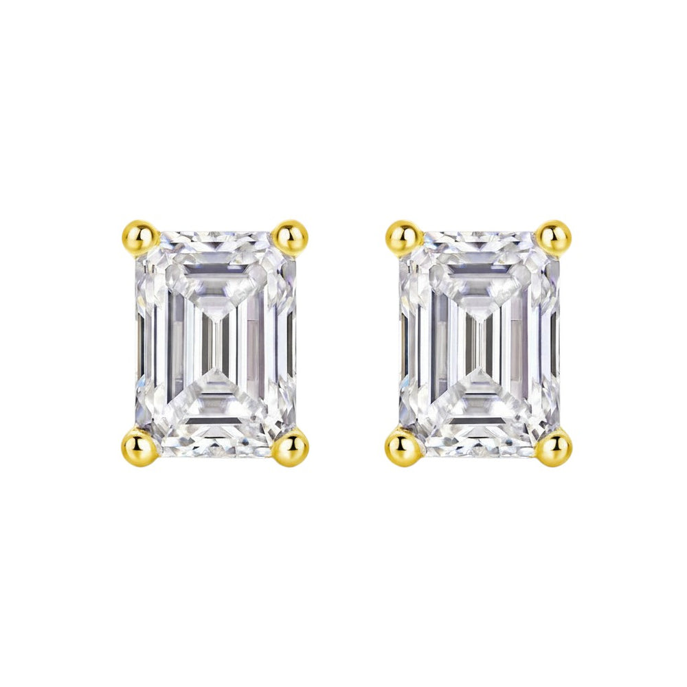 Pair of emerald cut moissanite stud earrings in yellow gold vermeil