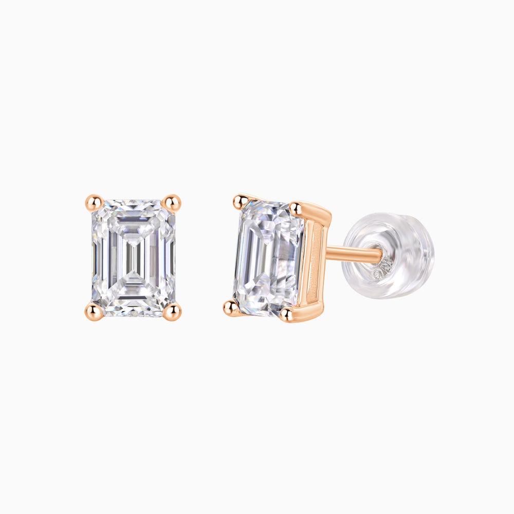 Emerald cut moissanite studs, side view; rose gold vermeil backing and clear stone