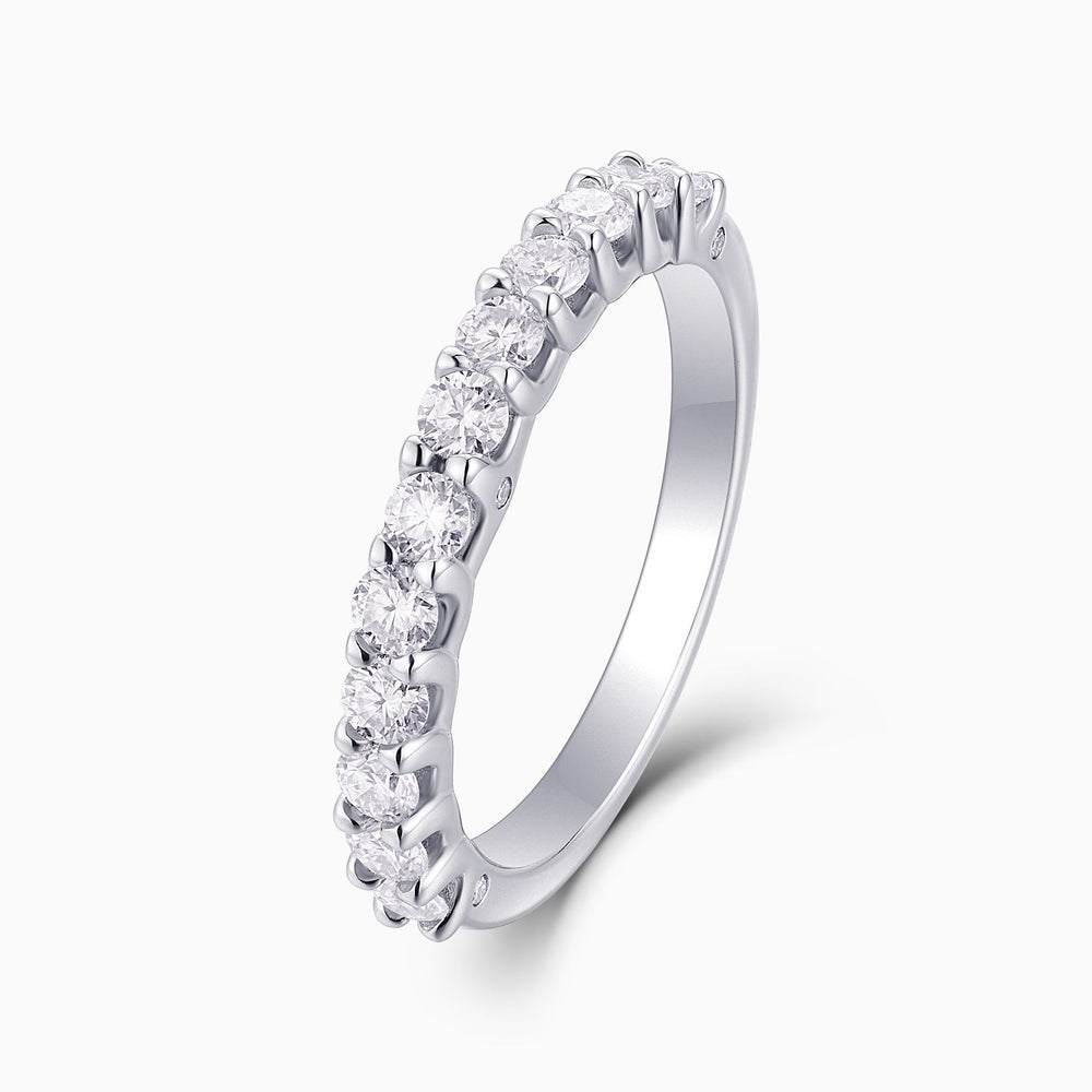 Half pavé eternity band, white gold vermeil, side view of round moissanite stones