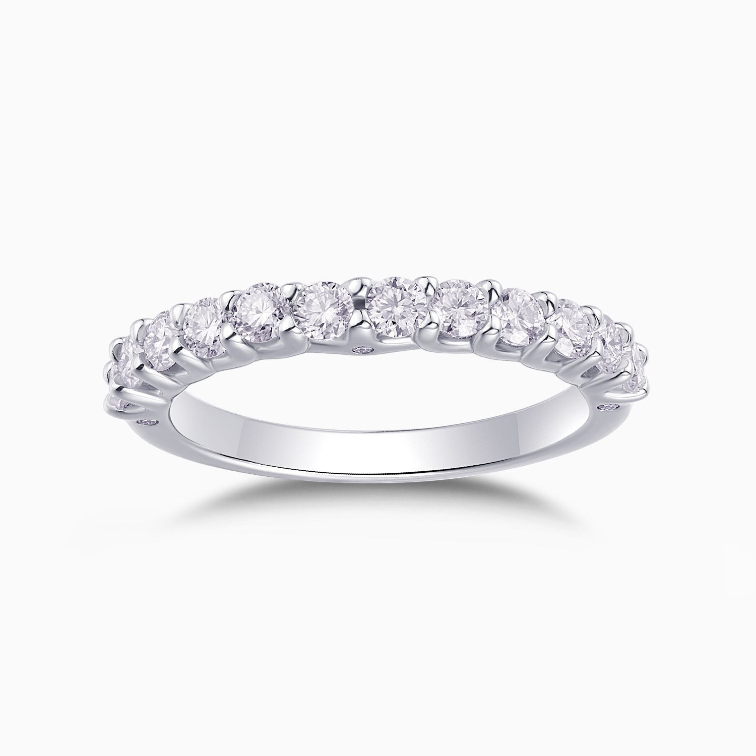 Half pavé eternity band in white gold vermeil with round moissanite stones