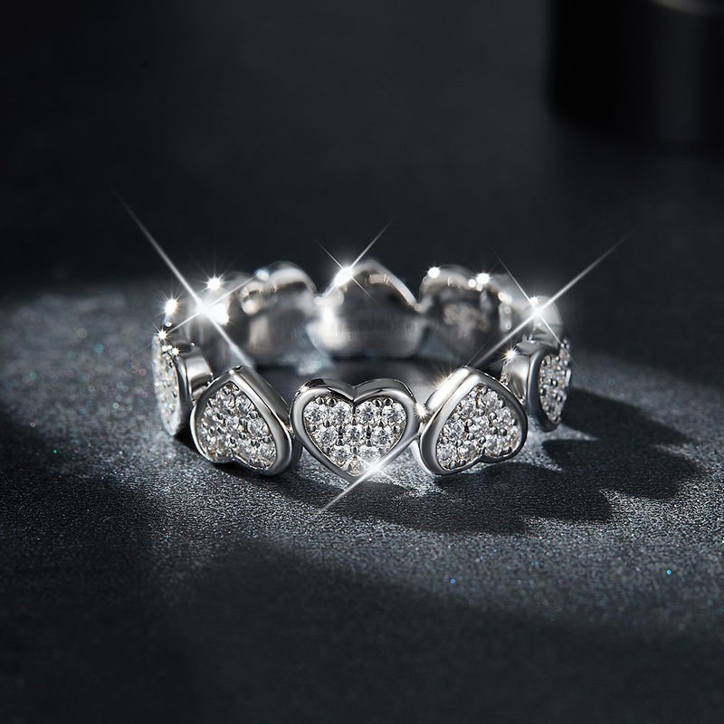 Heart moissanite band with six raised hearts, white gold vermeil finish
