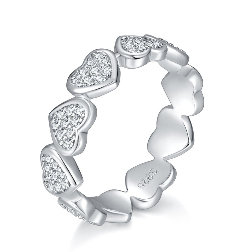 Heart moissanite ring side view, raised heart stones, white gold vermeil finish