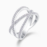 Side view: criss-cross wide band moissanite ring with pavé detailing
