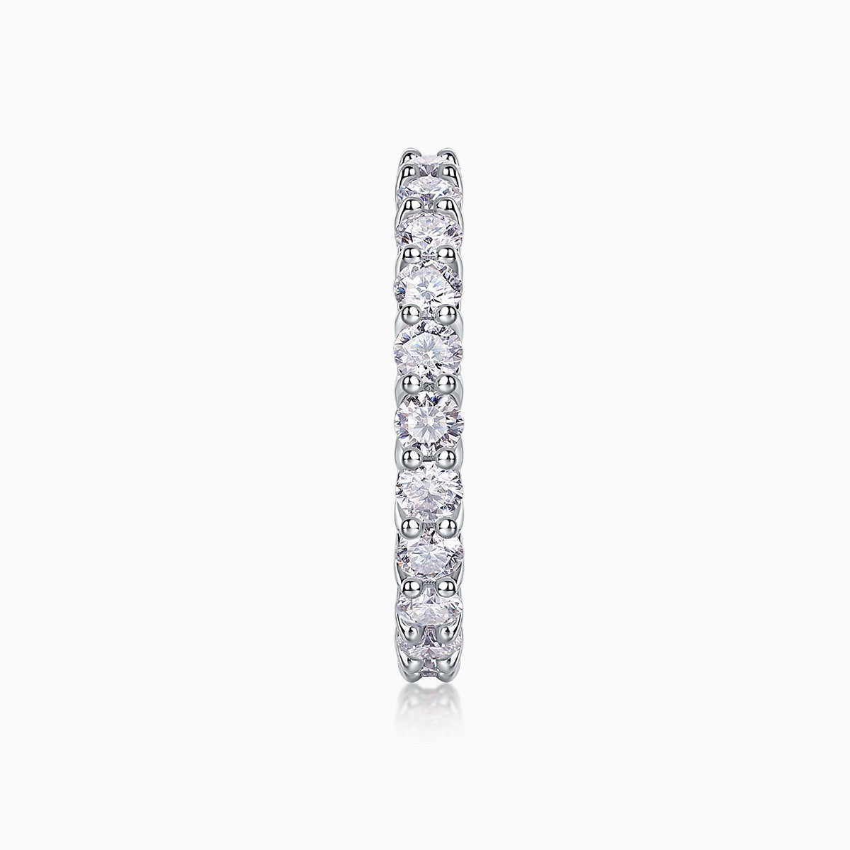 Vertical side profile of pavé eternity band with round moissanite stones, white gold vermeil