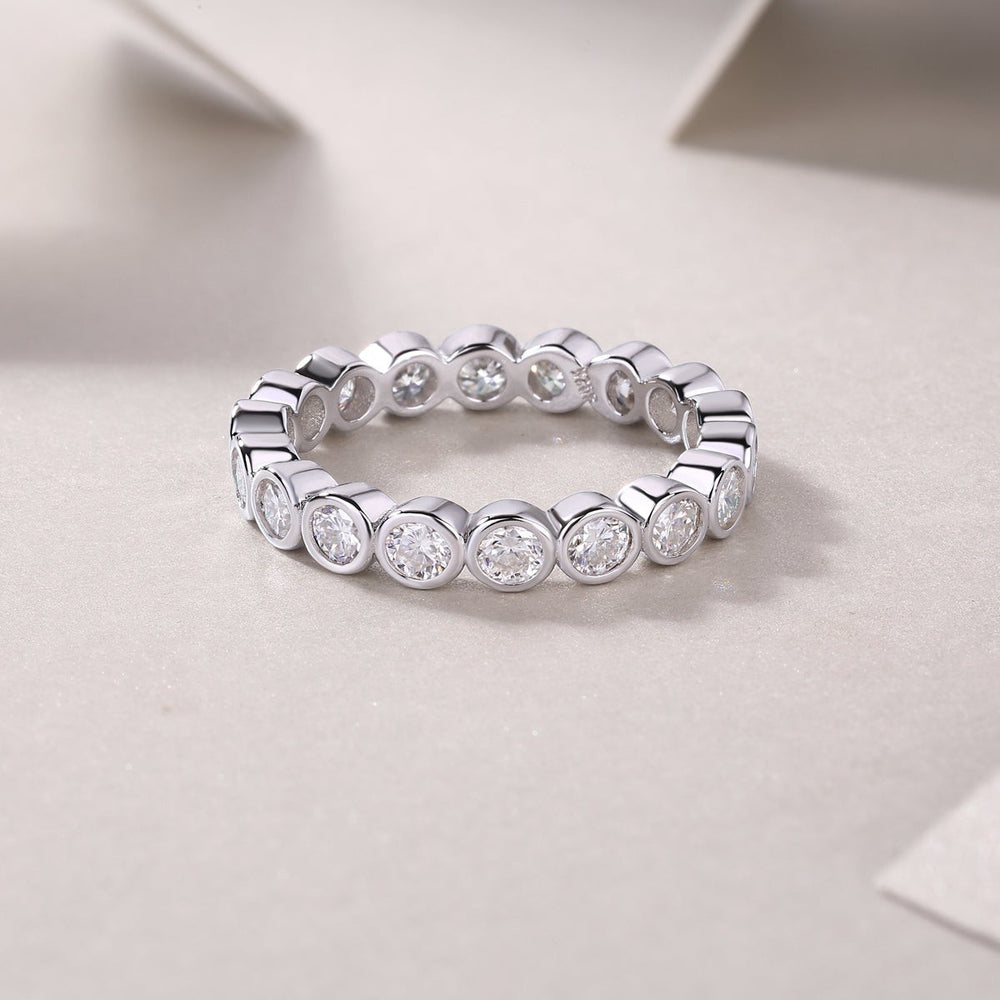 White gold vermeil eternity band ring with continuous round stones, close-up