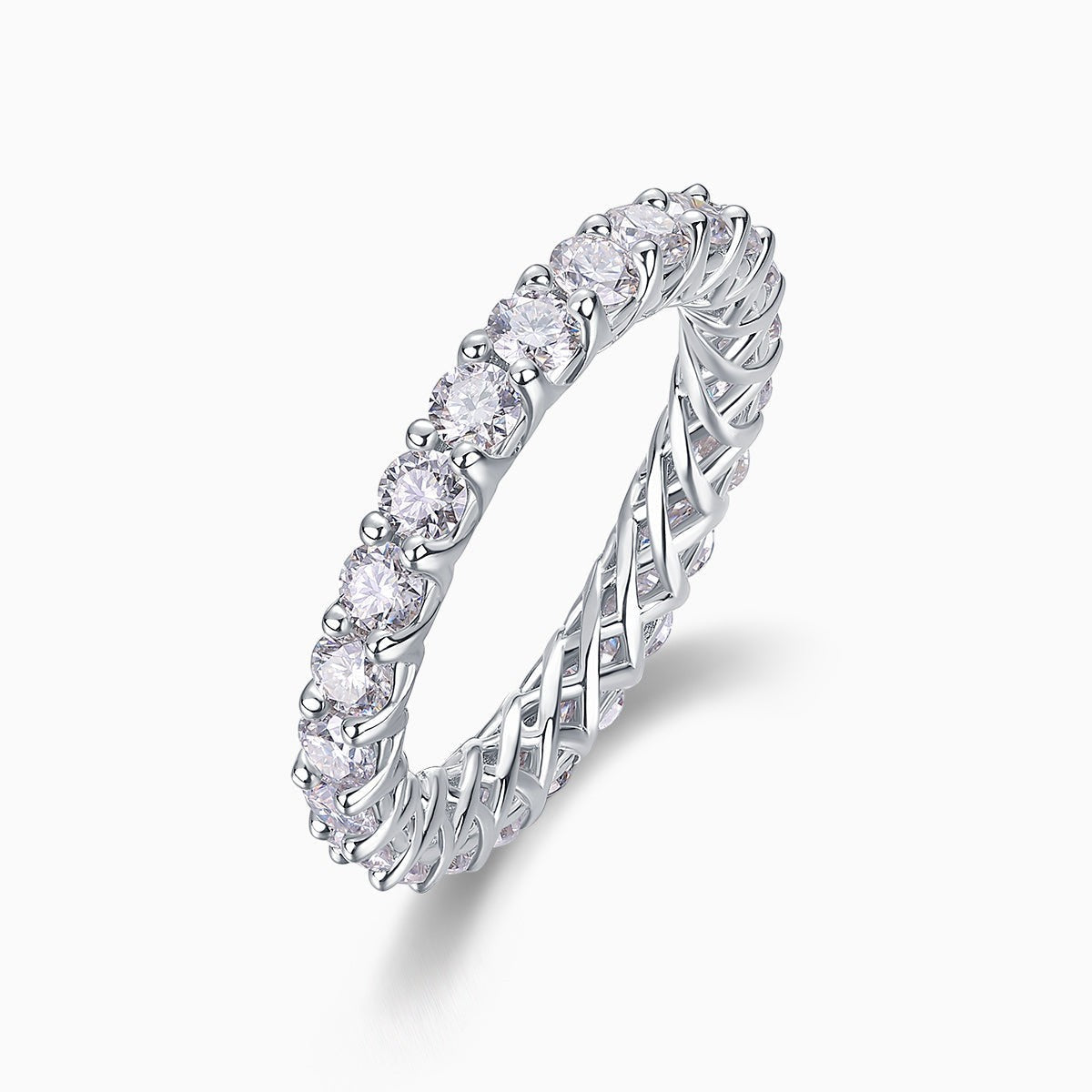 Side view of moissanite pavé eternity band with round stones and braided metal gallery