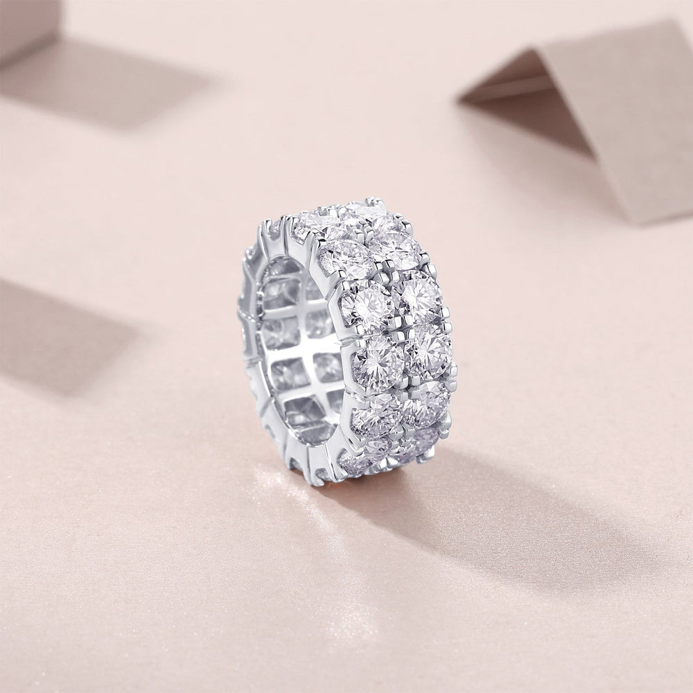 Side view of double-row moissanite eternity band with bezel-set stones