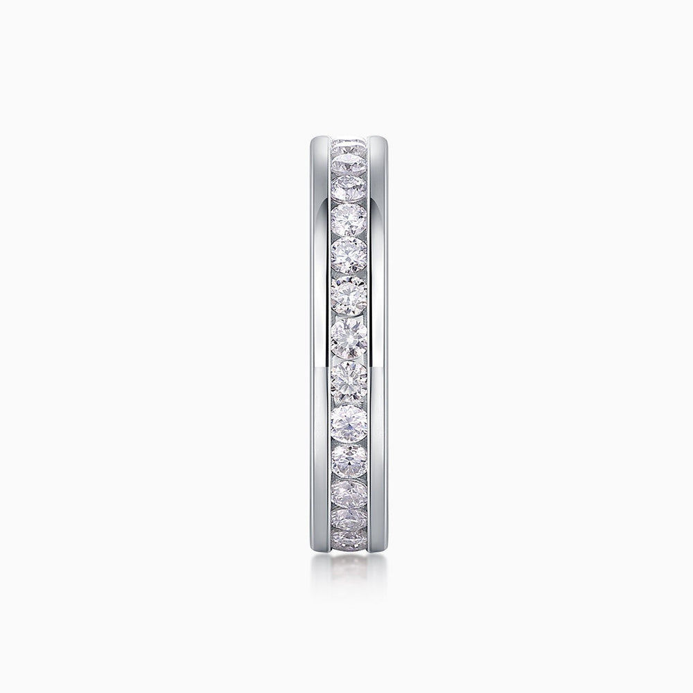 Slim eternity band, side view of metal frame with vertical row of round stones