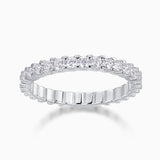 White gold vermeil moissanite pavé eternity band with a continuous row of round stones
