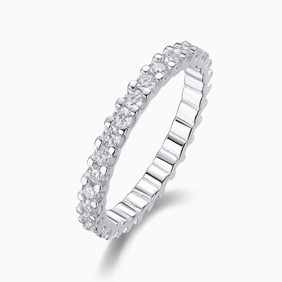 Moissanite pavé eternity band, angled view showing multiple round stone settings