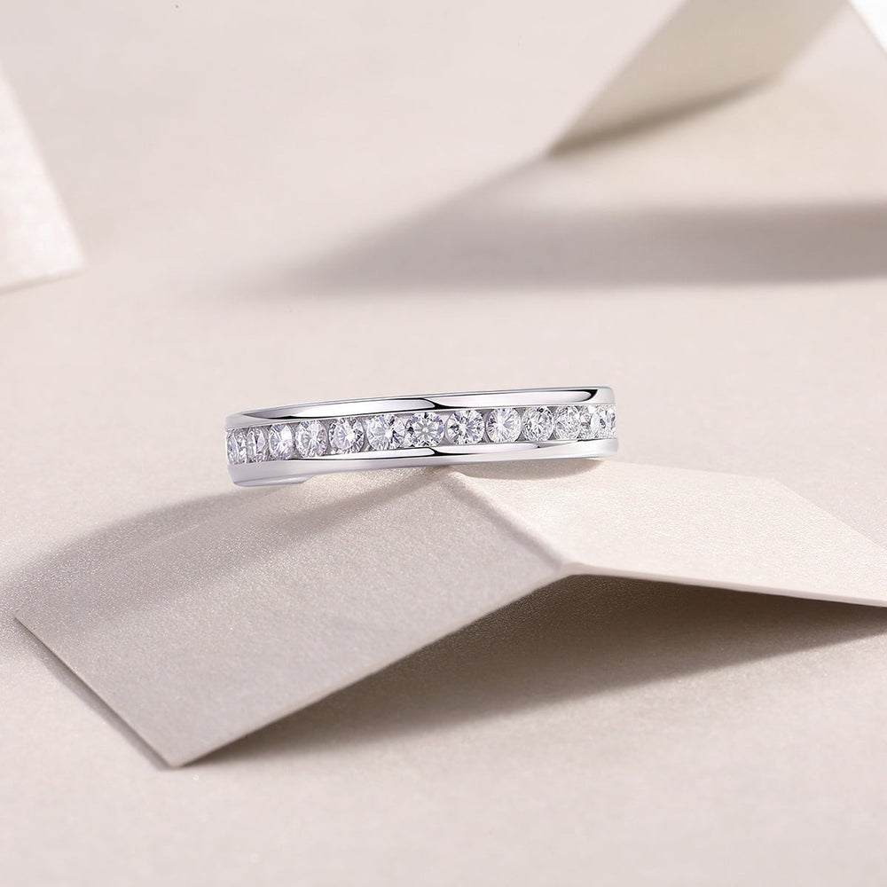 Round moissanite eternity ring, side profile with continuous row of round stones