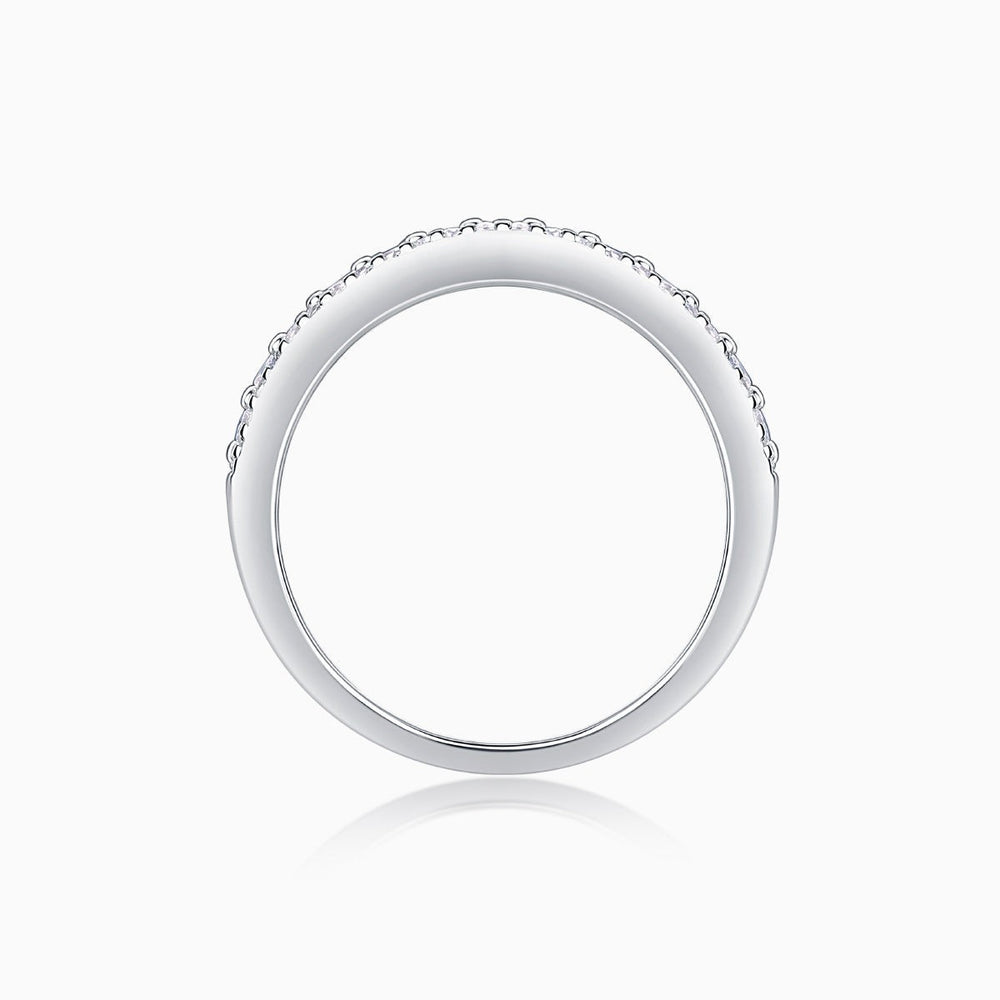 Four-row pavé moissanite eternity band, white gold vermeil, top view of band