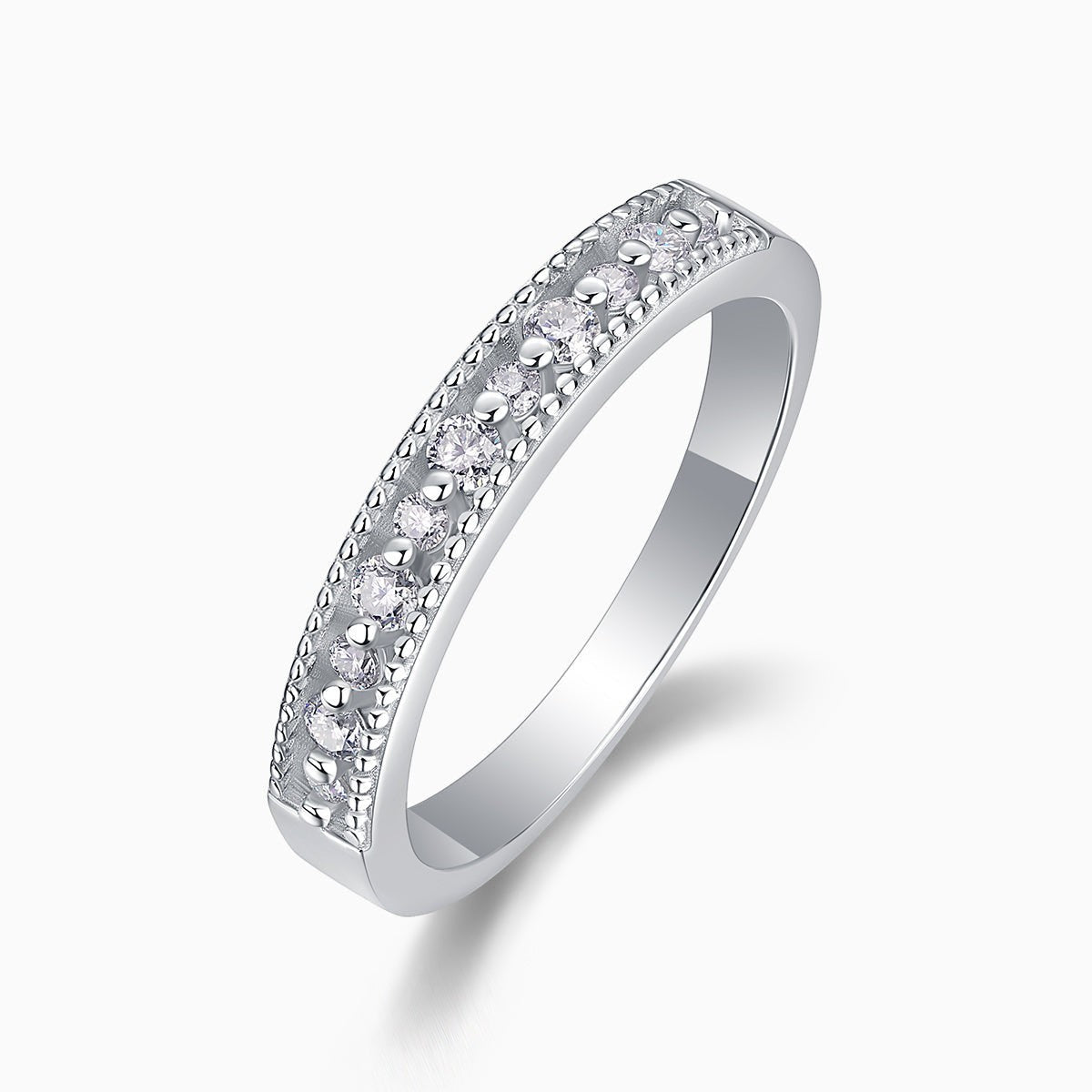 Moissanite half pavé eternity band in white gold vermeil with bezel-set round stones