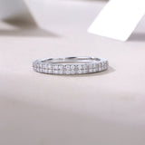 White gold vermeil half eternity band, continuous pavé row of round stones