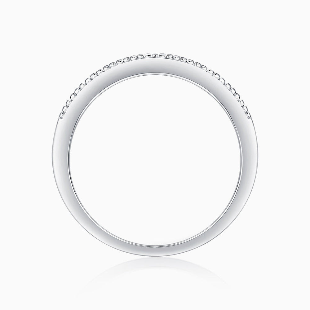 White gold vermeil band with a continuous pavé row of small round stones