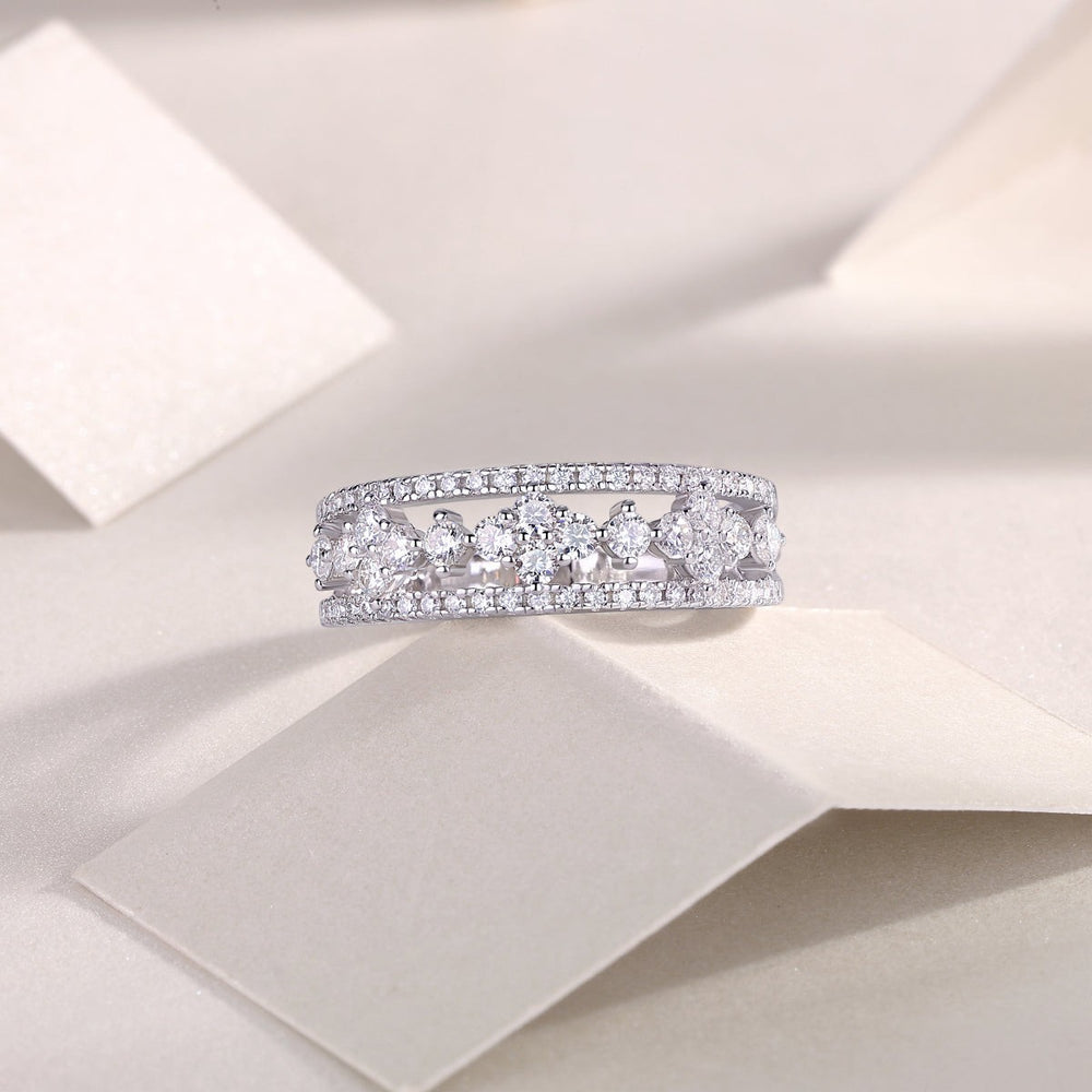 Moissanite half-row wedding band with central sparkle stones and pavé stone surround