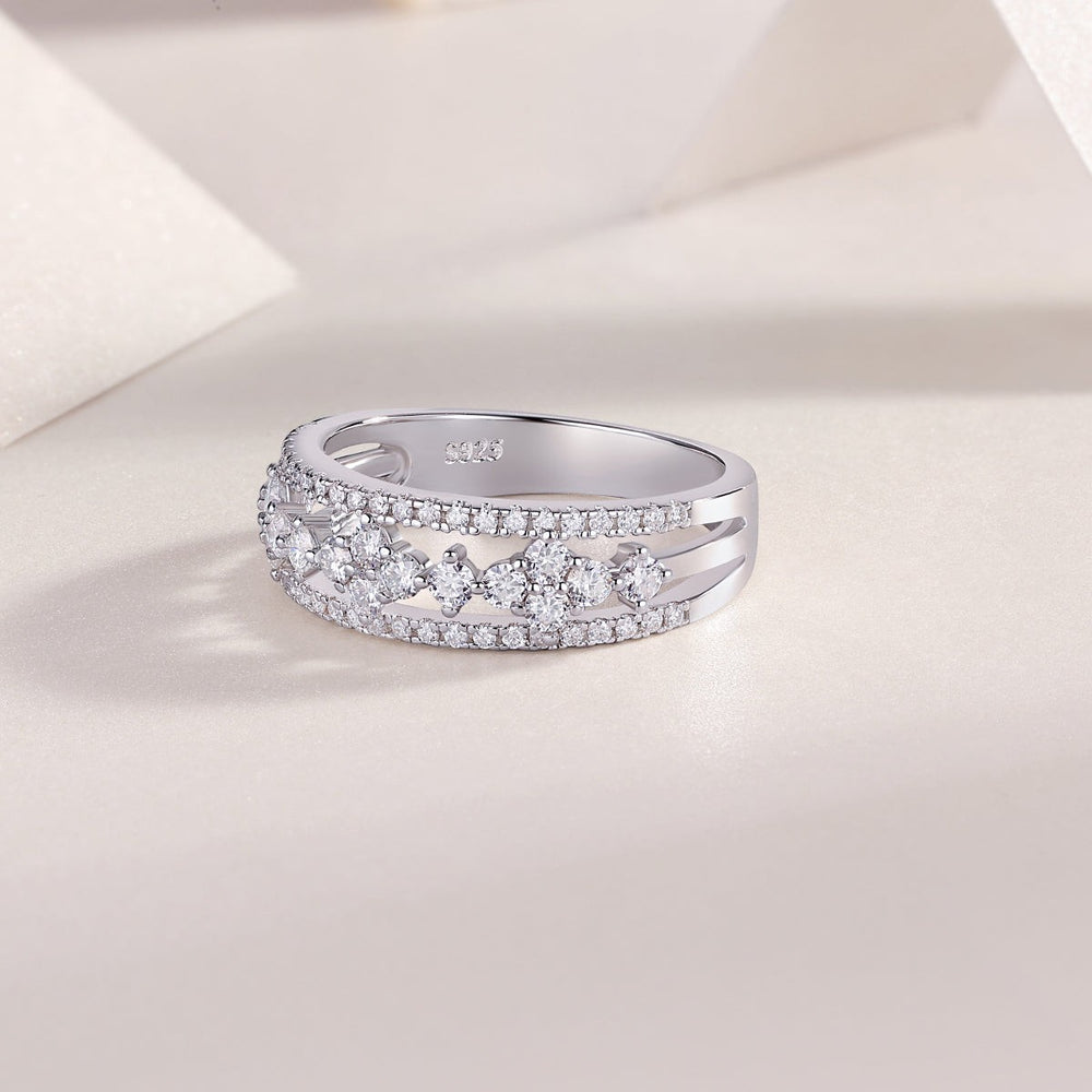 Half-row moissanite wedding band with bezel-set stones and pavé detailing, white gold vermeil