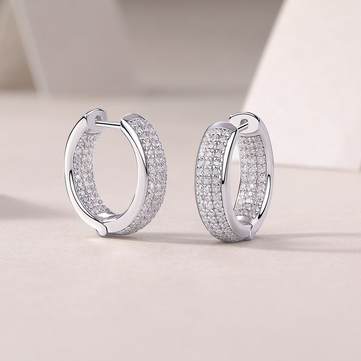 Moissanite huggie hoops, white gold vermeil, pavé stones, hinge and inside view.