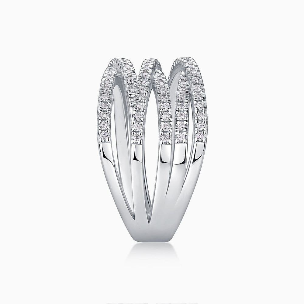 Crossover moissanite band profile, smooth inner shank with pavé outer rows