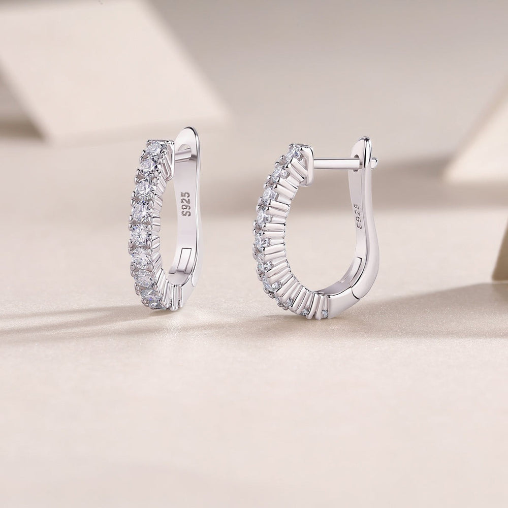White gold vermeil huggie hoop earrings with pavé moissanite stones, side view