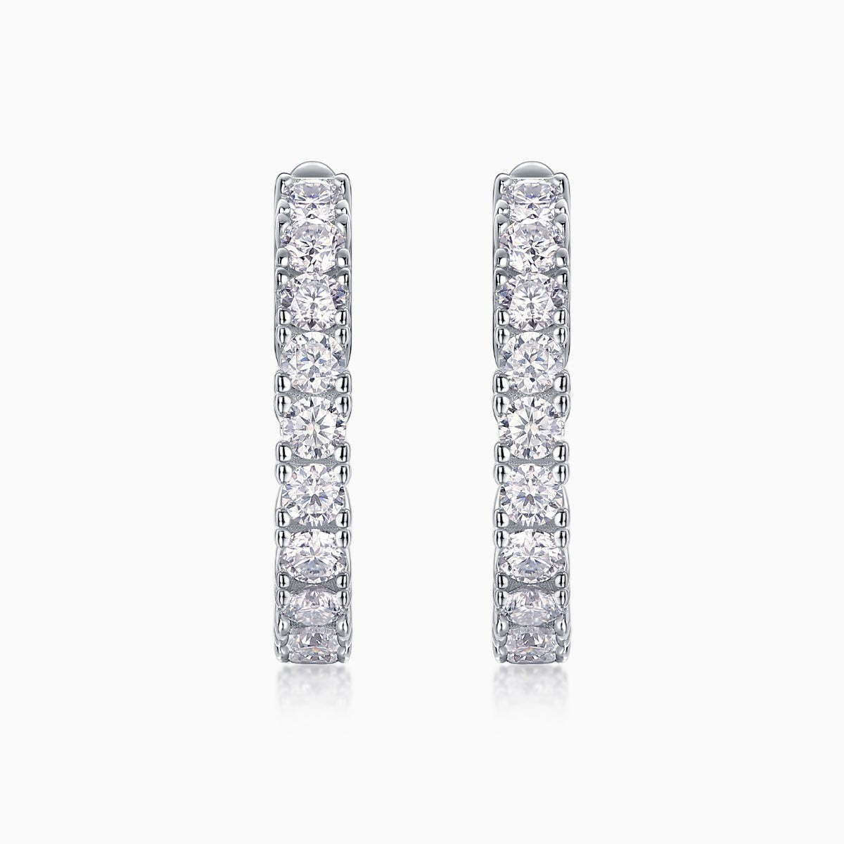 White gold vermeil hoop earrings with pavé-set moissanite squares along the band