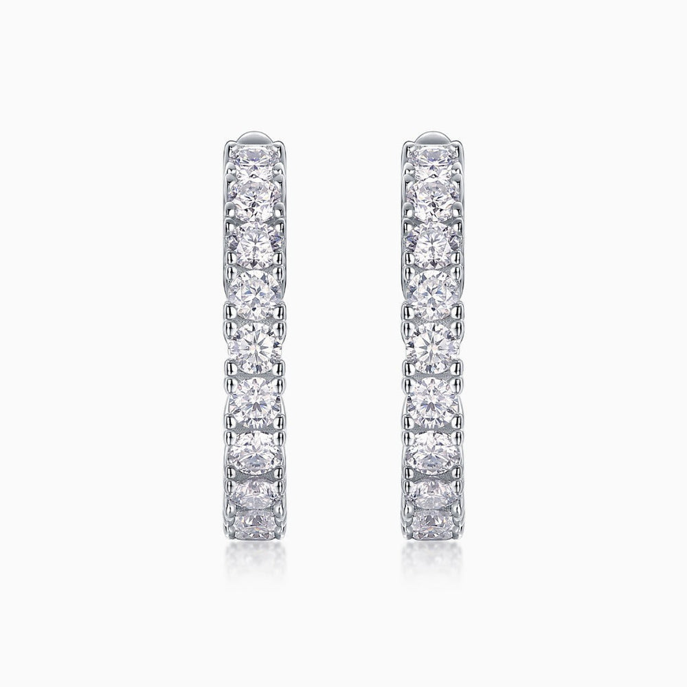 White gold vermeil hoop earrings with pavé-set moissanite squares along the band