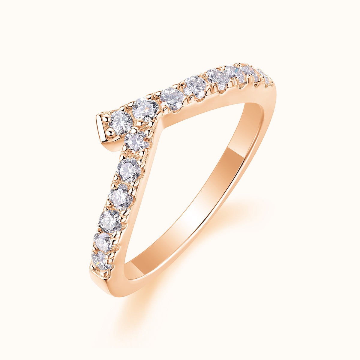 Curved pavé moissanite band, rose gold vermeil, angled view of raised round stones