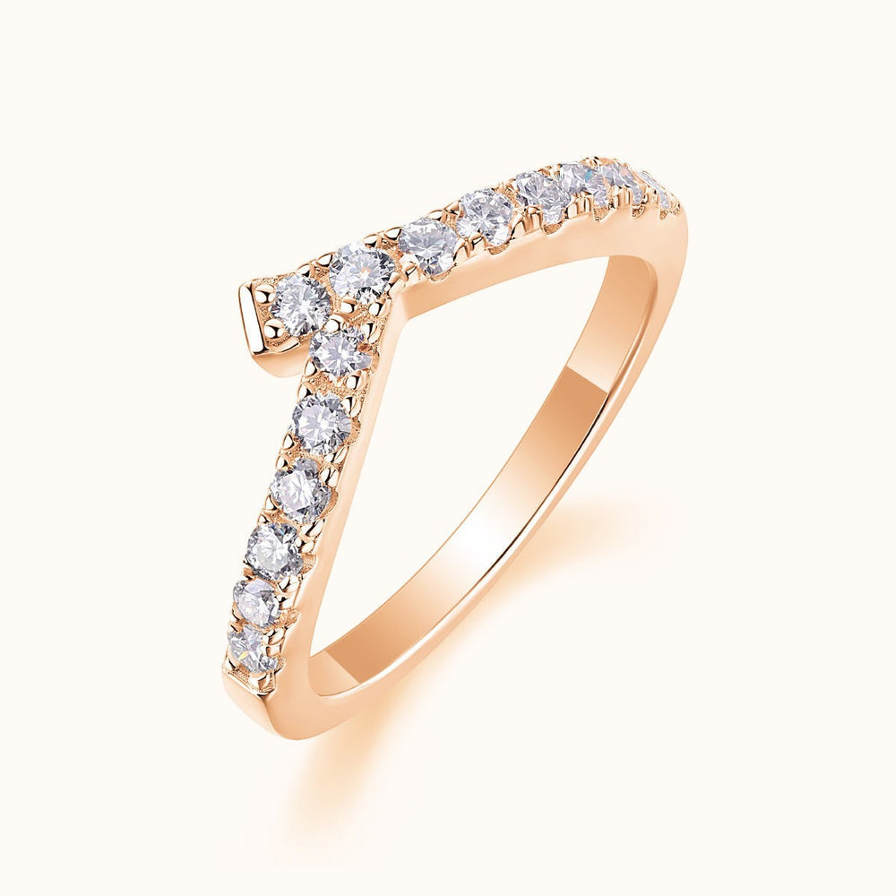 Curved pavé moissanite band, rose gold vermeil, angled view of raised round stones
