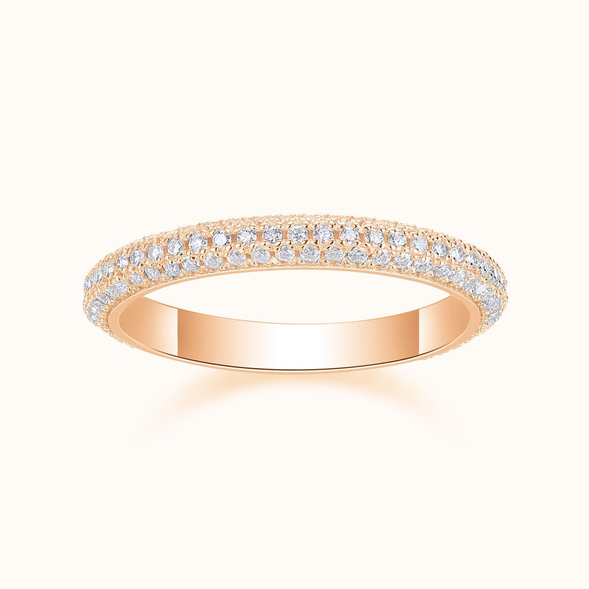 Rose gold vermeil moissanite pavé wedding band with continuous row of round stones